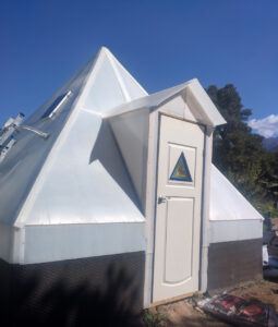 Custom Pitched Greenhouse with Solexx Plastic Covering